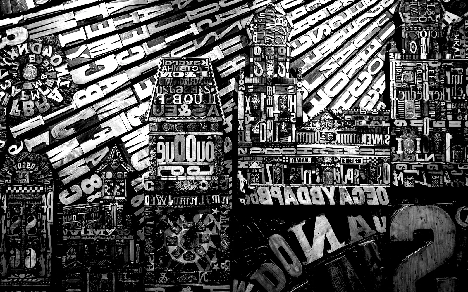 Wood type massed in a compositor’s frame, seen from above.